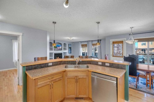6 Morningside Landing Sw, Airdrie, AB - Indoor Photo Showing Kitchen With Double Sink