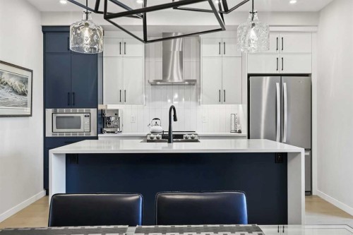 709 Marine Drive Se, Calgary, AB - Indoor Photo Showing Kitchen With Stainless Steel Kitchen With Upgraded Kitchen