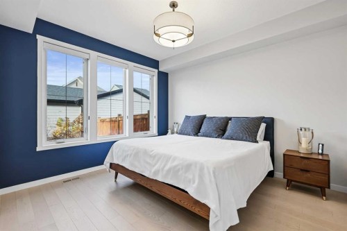 709 Marine Drive Se, Calgary, AB - Indoor Photo Showing Bedroom