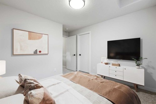 709 Marine Drive Se, Calgary, AB - Indoor Photo Showing Bedroom