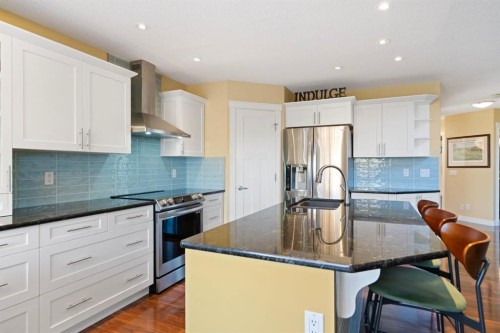 27 Gleneagles Terrace, Cochrane, AB - Indoor Photo Showing Kitchen With Stainless Steel Kitchen With Upgraded Kitchen