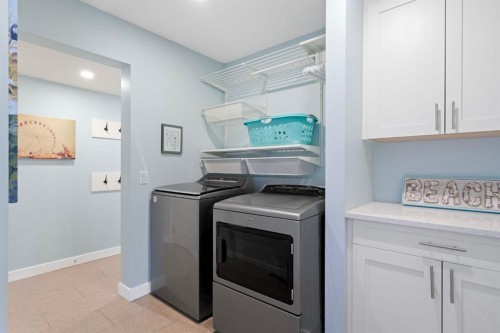 27 Gleneagles Terrace, Cochrane, AB - Indoor Photo Showing Laundry Room