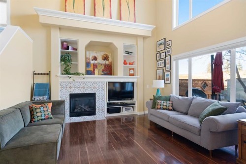 27 Gleneagles Terrace, Cochrane, AB - Indoor Photo Showing Living Room With Fireplace