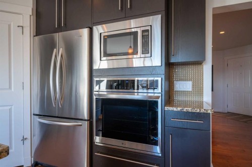 82 Chapalina Close Se, Calgary, AB - Indoor Photo Showing Kitchen With Upgraded Kitchen