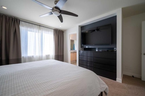 82 Chapalina Close Se, Calgary, AB - Indoor Photo Showing Bedroom