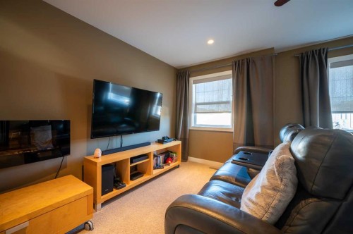 82 Chapalina Close Se, Calgary, AB - Indoor Photo Showing Living Room