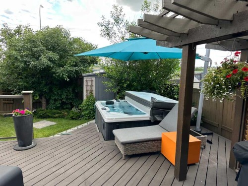 82 Chapalina Close Se, Calgary, AB - Outdoor With Deck Patio Veranda