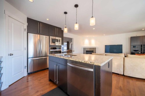 82 Chapalina Close Se, Calgary, AB - Indoor Photo Showing Kitchen With Upgraded Kitchen