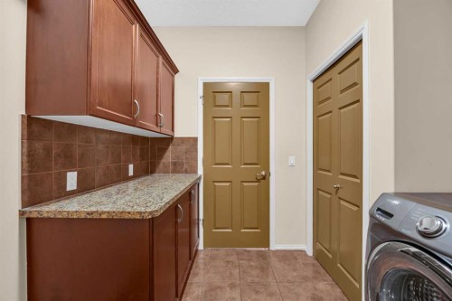 109 Bridlerange Place Sw, Calgary, AB - Indoor Photo Showing Laundry Room