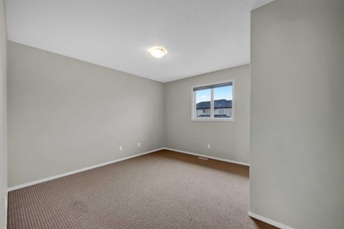 109 Bridlerange Place Sw, Calgary, AB - Indoor Photo Showing Other Room