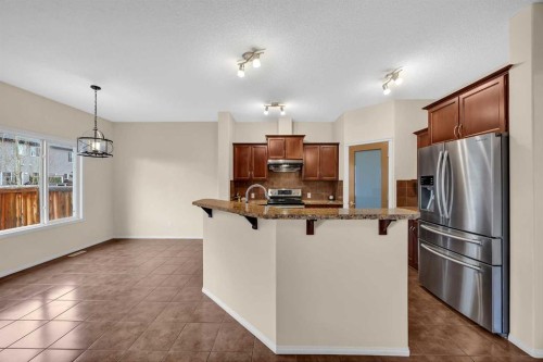 109 Bridlerange Place Sw, Calgary, AB - Indoor Photo Showing Kitchen With Stainless Steel Kitchen