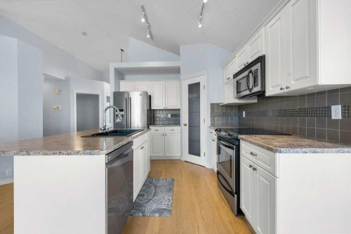 58 Chaparral Close Se, Calgary, AB - Indoor Photo Showing Kitchen With Upgraded Kitchen