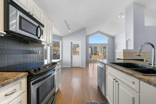 58 Chaparral Close Se, Calgary, AB - Indoor Photo Showing Kitchen With Double Sink