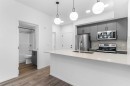 #217-140 Mahogany Street Se, Calgary, AB  - Indoor Photo Showing Kitchen With Stainless Steel Kitchen With Upgraded Kitchen 