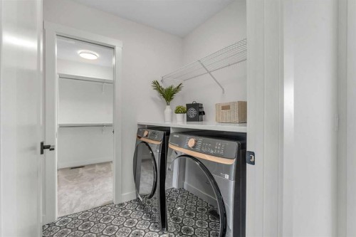 303 Kinniburgh Loop, Chestermere, AB - Indoor Photo Showing Laundry Room