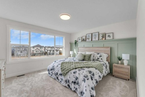 303 Kinniburgh Loop, Chestermere, AB - Indoor Photo Showing Bedroom