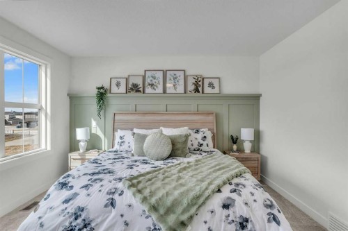 303 Kinniburgh Loop, Chestermere, AB - Indoor Photo Showing Bedroom