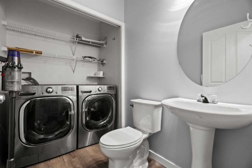 49 Somerside Close Sw, Calgary, AB - Indoor Photo Showing Laundry Room