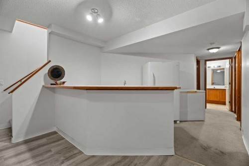 49 Somerside Close Sw, Calgary, AB - Indoor Photo Showing Other Room