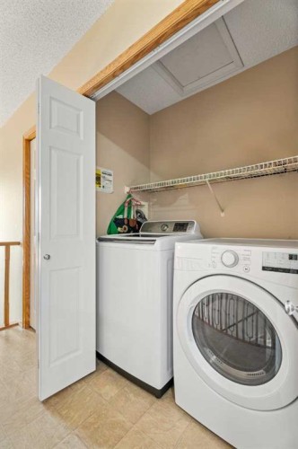 51 Westfall Crescent, Okotoks, AB - Indoor Photo Showing Laundry Room