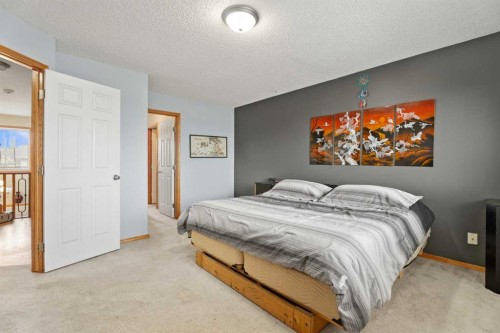 51 Westfall Crescent, Okotoks, AB - Indoor Photo Showing Bedroom