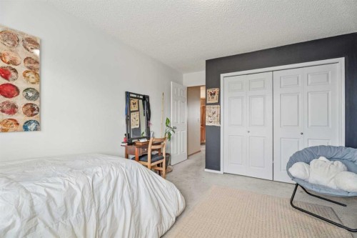 51 Westfall Crescent, Okotoks, AB - Indoor Photo Showing Bedroom