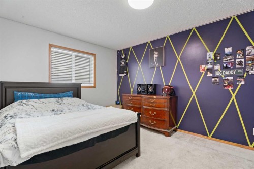 51 Westfall Crescent, Okotoks, AB - Indoor Photo Showing Bedroom