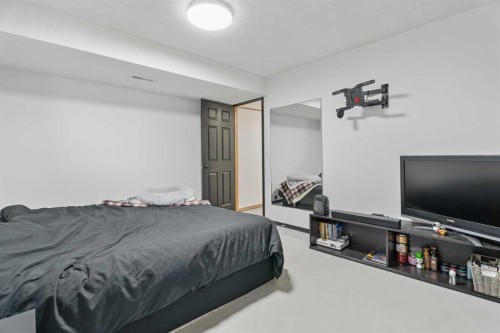 51 Westfall Crescent, Okotoks, AB - Indoor Photo Showing Bedroom