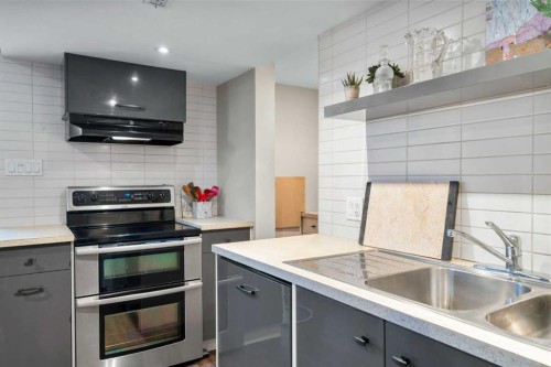 7 Creston Crescent Nw, Calgary, AB - Indoor Photo Showing Kitchen With Double Sink