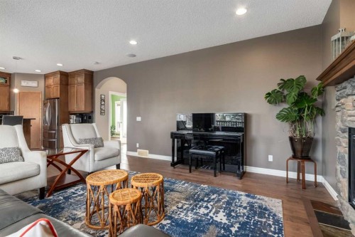 227 Tuscany Glen Park Nw, Calgary, AB - Indoor Photo Showing Living Room