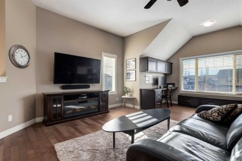227 Tuscany Glen Park Nw, Calgary, AB - Indoor Photo Showing Living Room