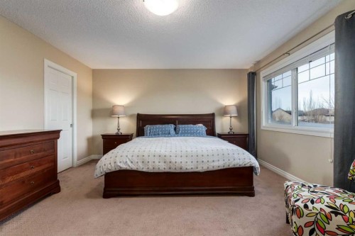 227 Tuscany Glen Park Nw, Calgary, AB - Indoor Photo Showing Bedroom