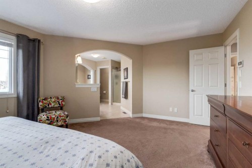 227 Tuscany Glen Park Nw, Calgary, AB - Indoor Photo Showing Bedroom