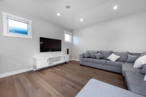 66 Waterford Road, Chestermere, AB - Indoor Photo Showing Living Room