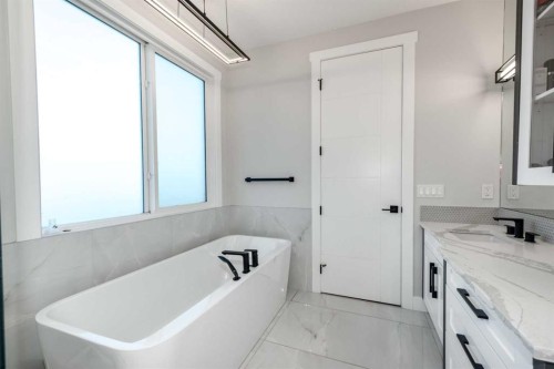 66 Waterford Road, Chestermere, AB - Indoor Photo Showing Bathroom