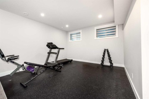 66 Waterford Road, Chestermere, AB - Indoor Photo Showing Gym Room