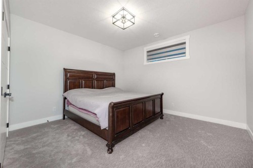 66 Waterford Road, Chestermere, AB - Indoor Photo Showing Bedroom