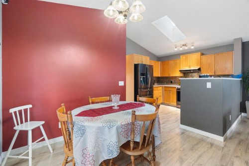 204 Hidden Spring Green Nw, Calgary, AB - Indoor Photo Showing Dining Room
