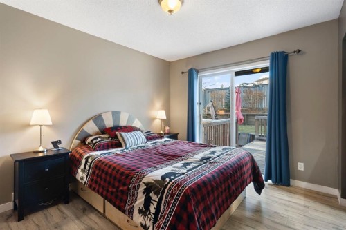 204 Hidden Spring Green Nw, Calgary, AB - Indoor Photo Showing Bedroom