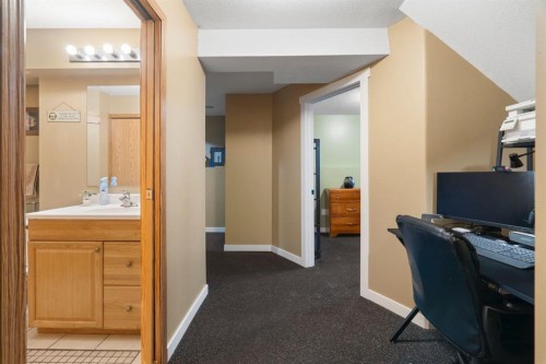 204 Hidden Spring Green Nw, Calgary, AB - Indoor Photo Showing Office