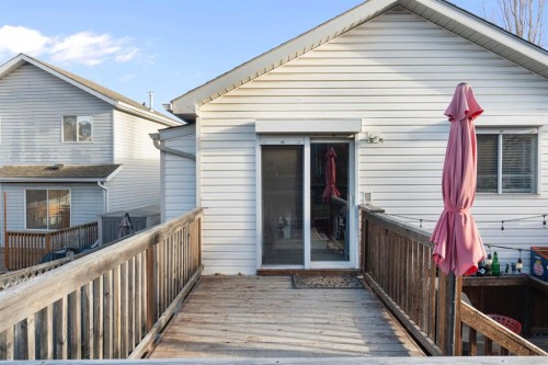 204 Hidden Spring Green Nw, Calgary, AB - Outdoor With Deck Patio Veranda With Exterior