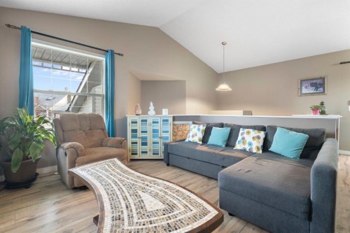 204 Hidden Spring Green Nw, Calgary, AB - Indoor Photo Showing Living Room