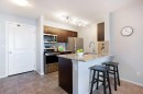 2316-81 Legacy Boulevard Se, Calgary, AB  - Indoor Photo Showing Kitchen With Stainless Steel Kitchen With Double Sink 