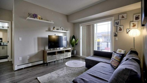 410-150 Auburn Meadows Manor Se, Calgary, AB - Indoor Photo Showing Living Room