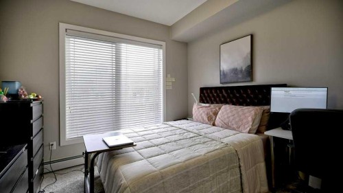 410-150 Auburn Meadows Manor Se, Calgary, AB - Indoor Photo Showing Bedroom
