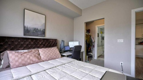 410-150 Auburn Meadows Manor Se, Calgary, AB - Indoor Photo Showing Bedroom