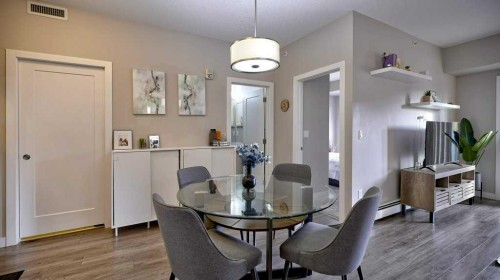 410-150 Auburn Meadows Manor Se, Calgary, AB - Indoor Photo Showing Dining Room