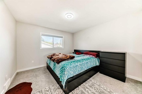6712 23 Avenue Ne, Calgary, AB - Indoor Photo Showing Bedroom