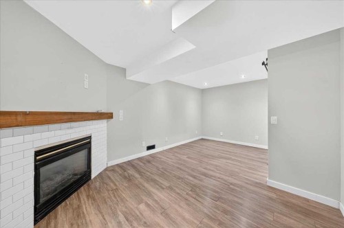 2103 Country Hills Circle Nw, Calgary, AB - Indoor With Fireplace