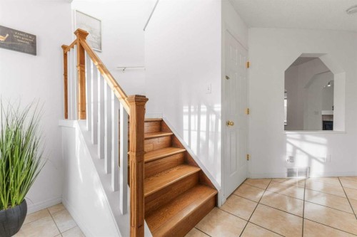 26 Arbour Butte Way Nw, Calgary, AB - Indoor Photo Showing Other Room